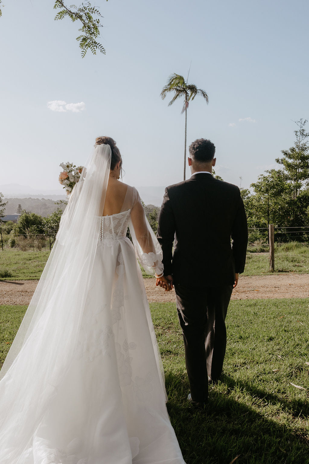 Customised Ella Moda Wedding Gown with Italian lace appliqué