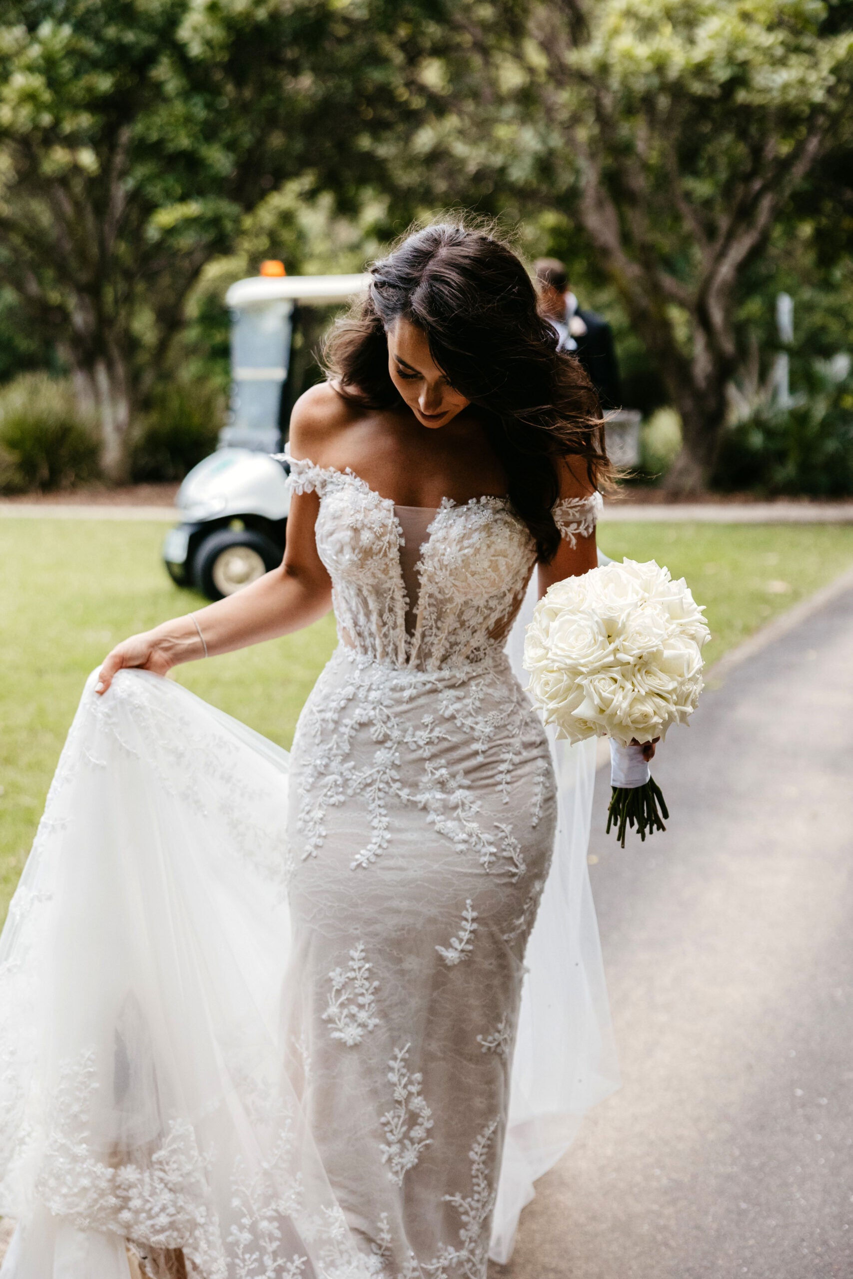Stunning Off-the-Shoulder Lace Wedding Gown with Long Train