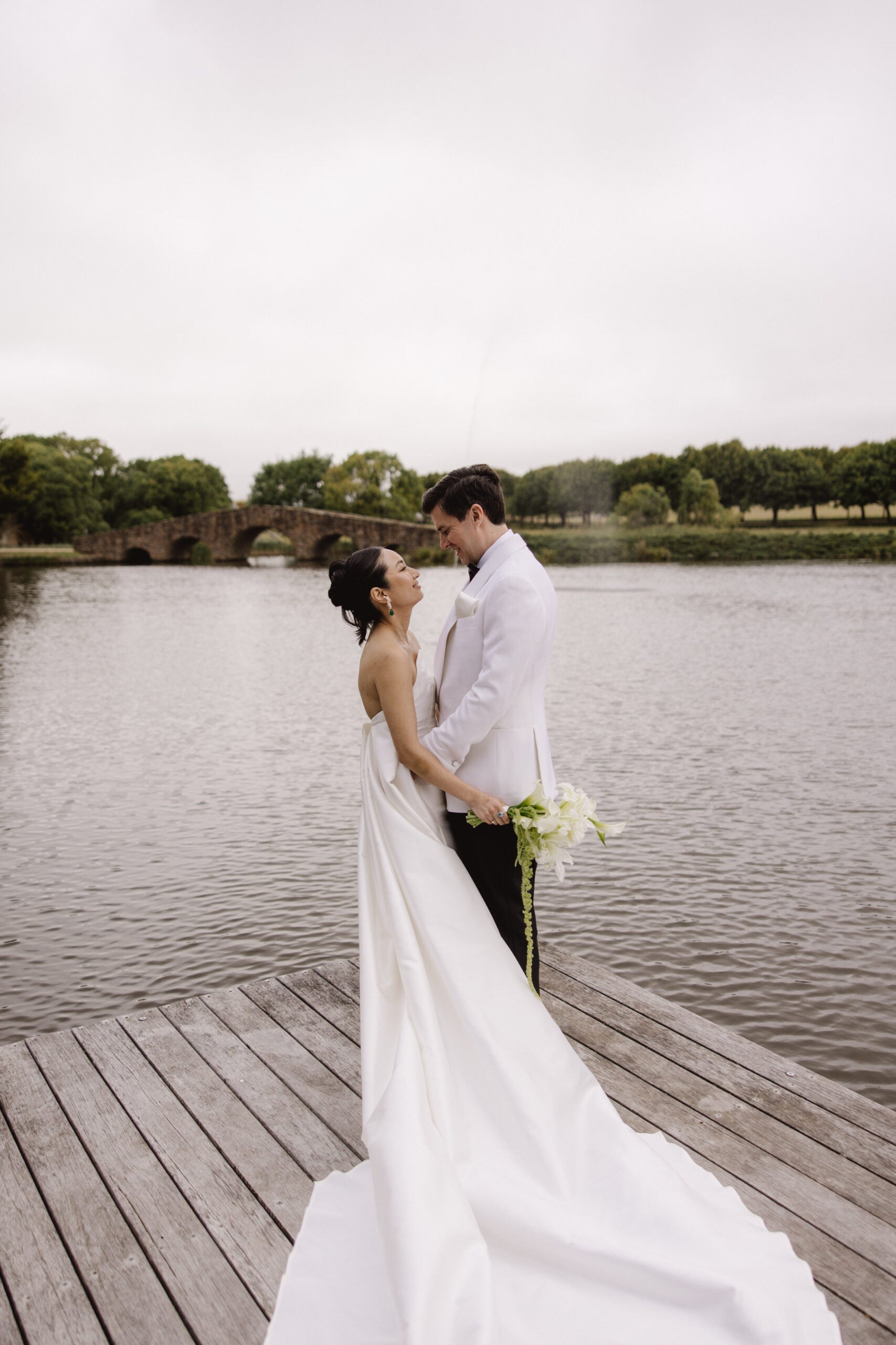 Minimalist 100% silk strapless structural dress with cape for modern bride by Blanc Wear Bridal
